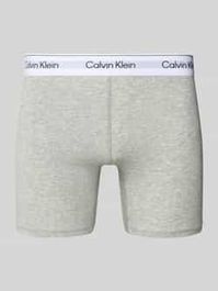 Broek met label in band