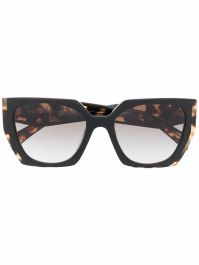 Prada eyewear zonnebril met cat-eye montuur - bruin