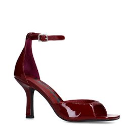 Rode sandalen met hak